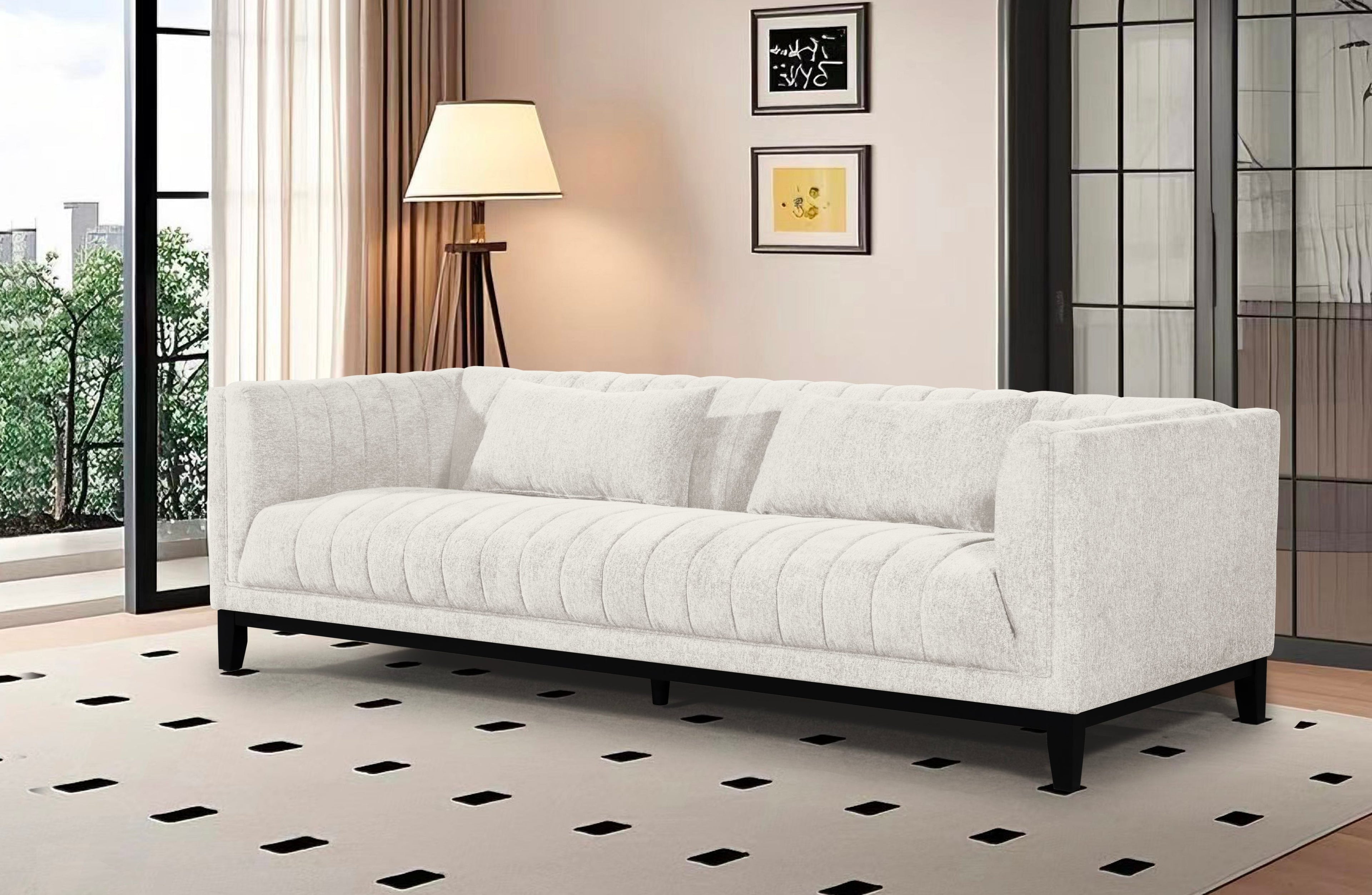 Austin Lounge Sofa in Cream – Modern 3-seater with a soft, airy look and tufted design, styled in a bright, elegant interior space.