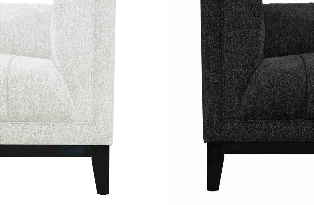 Austin Lounge Set detail view – Close-up of cream and black upholstery with premium textured fabric and solid wood legs in black finish.