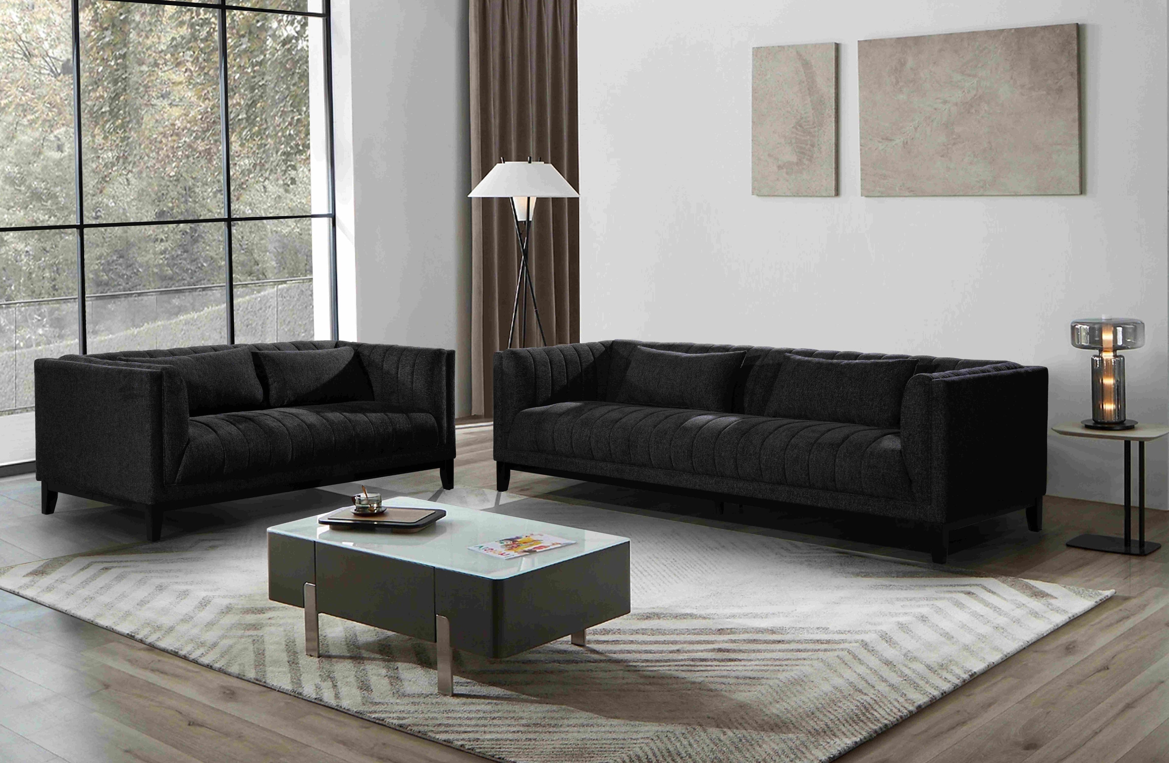 Austin Lounge Set in Charcoal – Stylish 2- and 3-seater combo in a chic modern living room, blending deep comfort with luxury statement design.