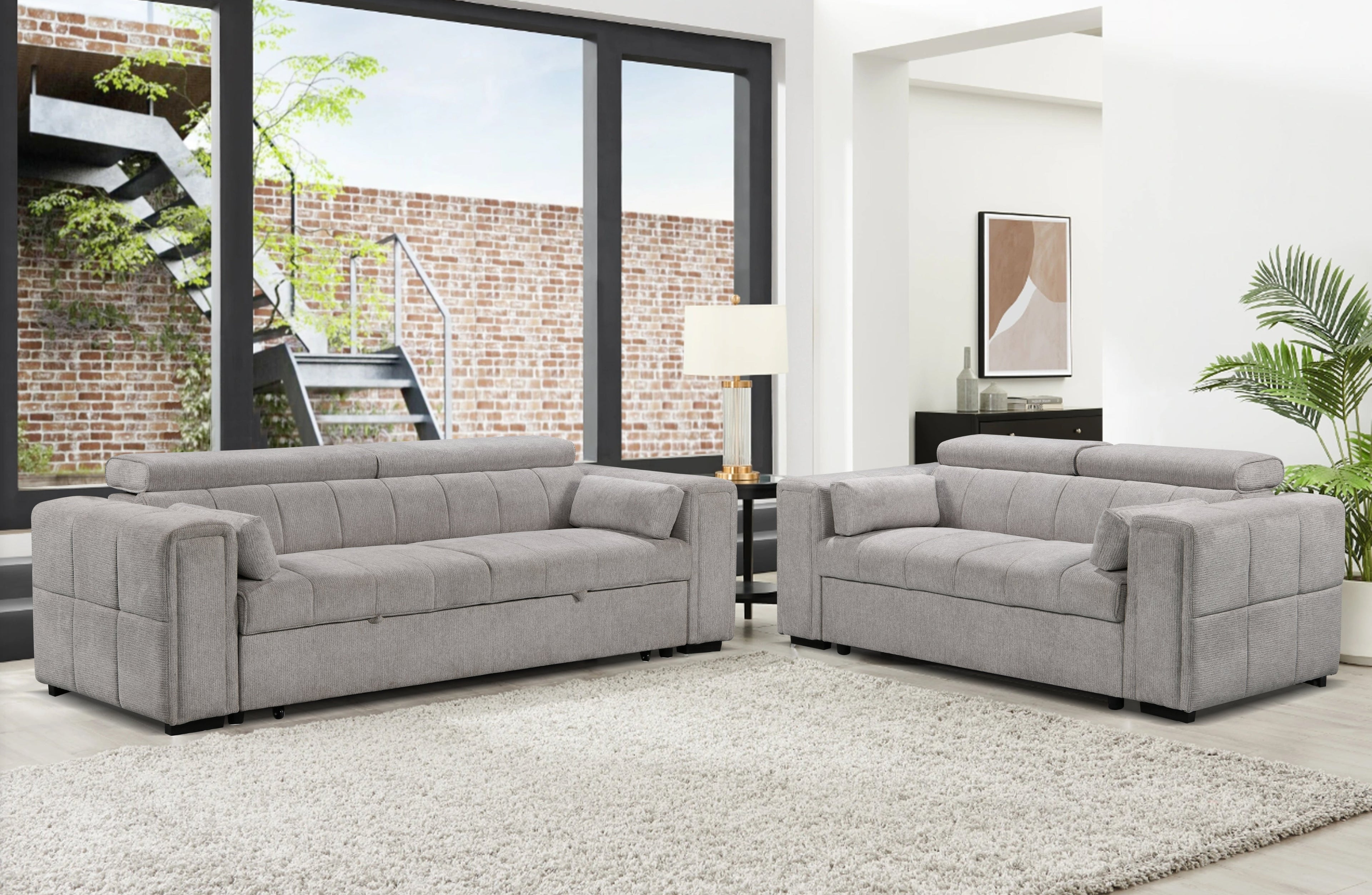 Elegant beige fabric sofa set in a modern living room with large windows, soft area rug, and natural light perfect blend of comfort and contemporary design.