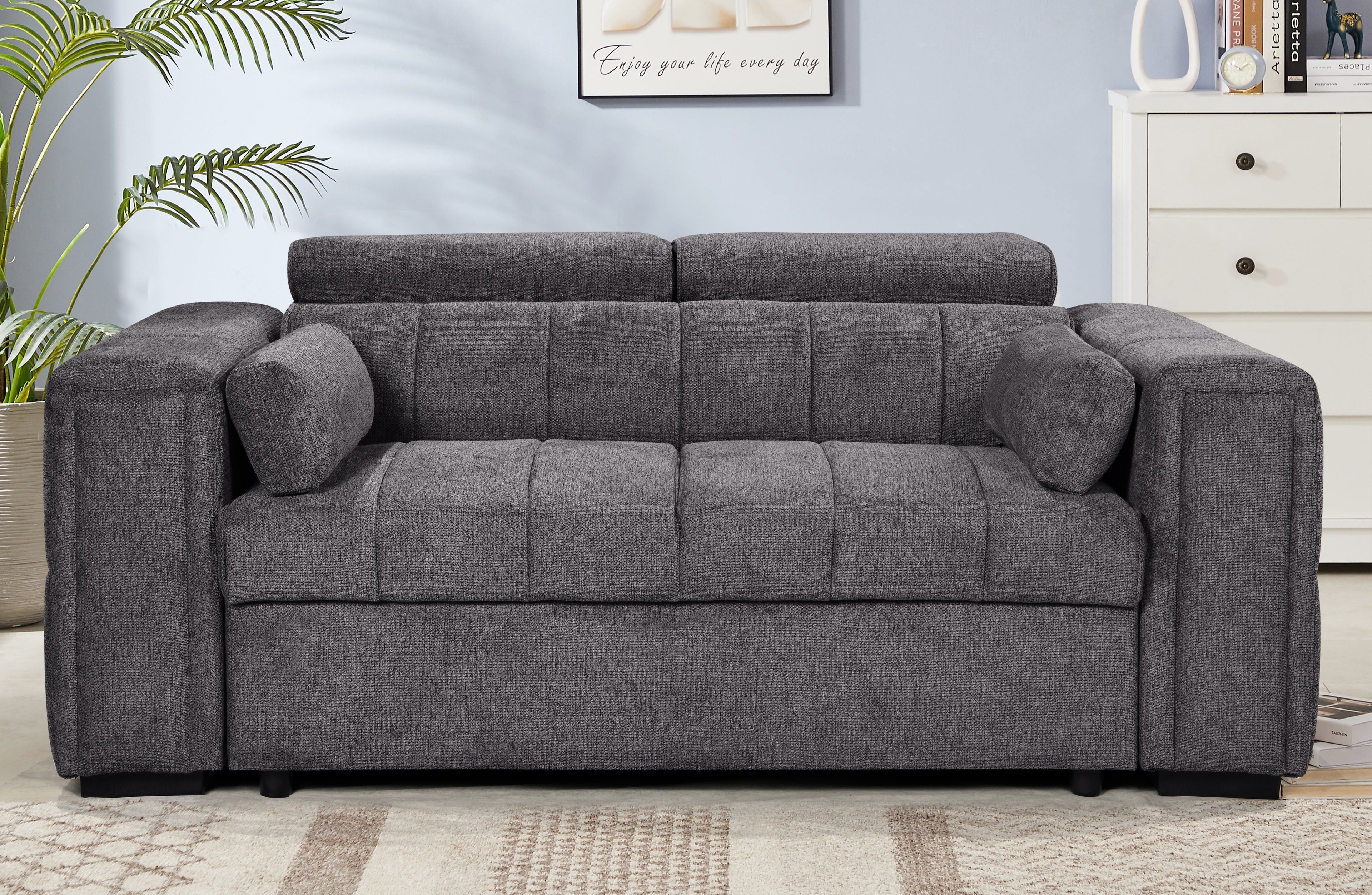 Modern grey 2-seater sofa with adjustable headrests and grid-stitched cushions – compact design ideal for contemporary living spaces