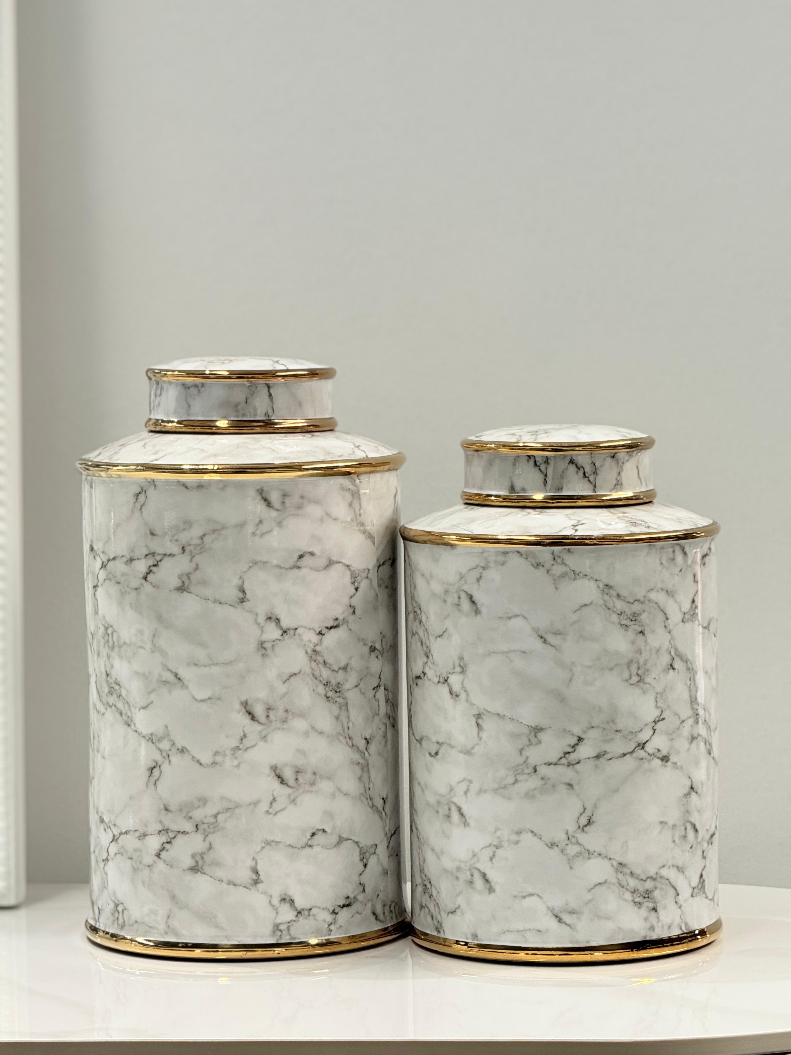 Carrara Ceramic Canister Set elegantly displayed in a modern interior – features luxurious marble texture with gold detailing