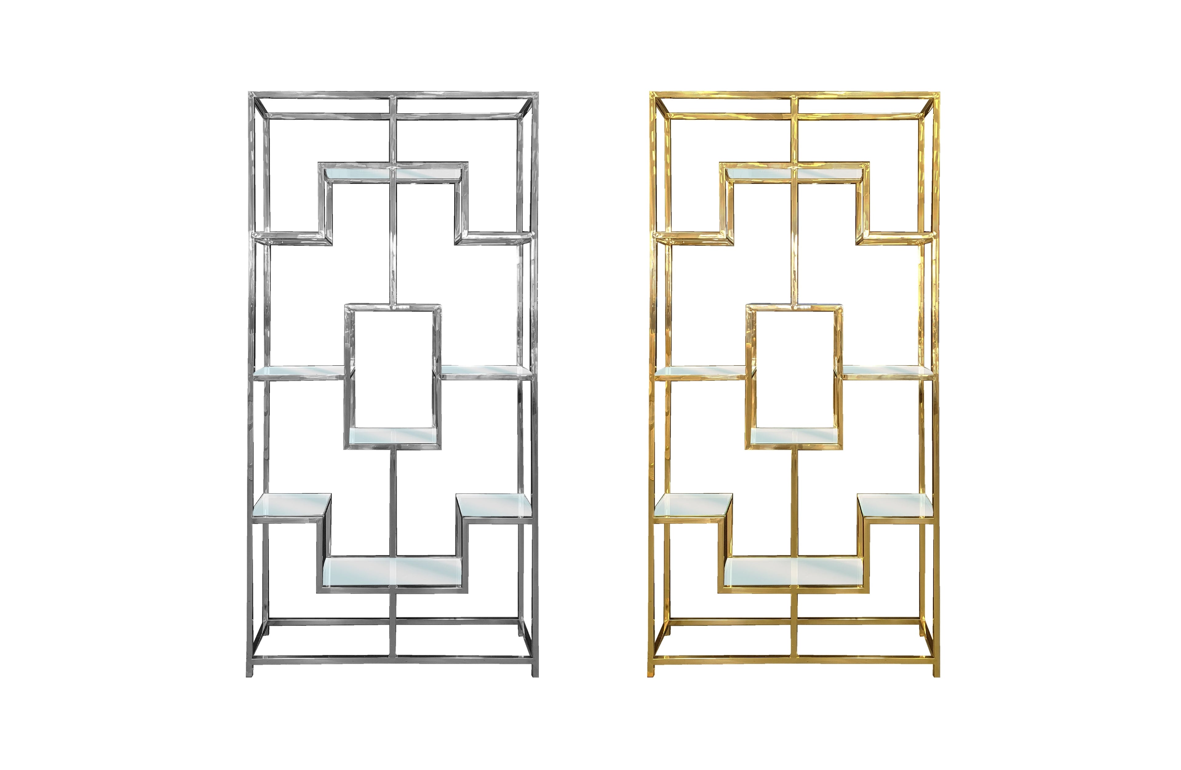 Nelson Bookcases in polished gold and silver finishes, featuring a modern geometric frame with glass shelves – elegant storage solutions for contemporary interiors.