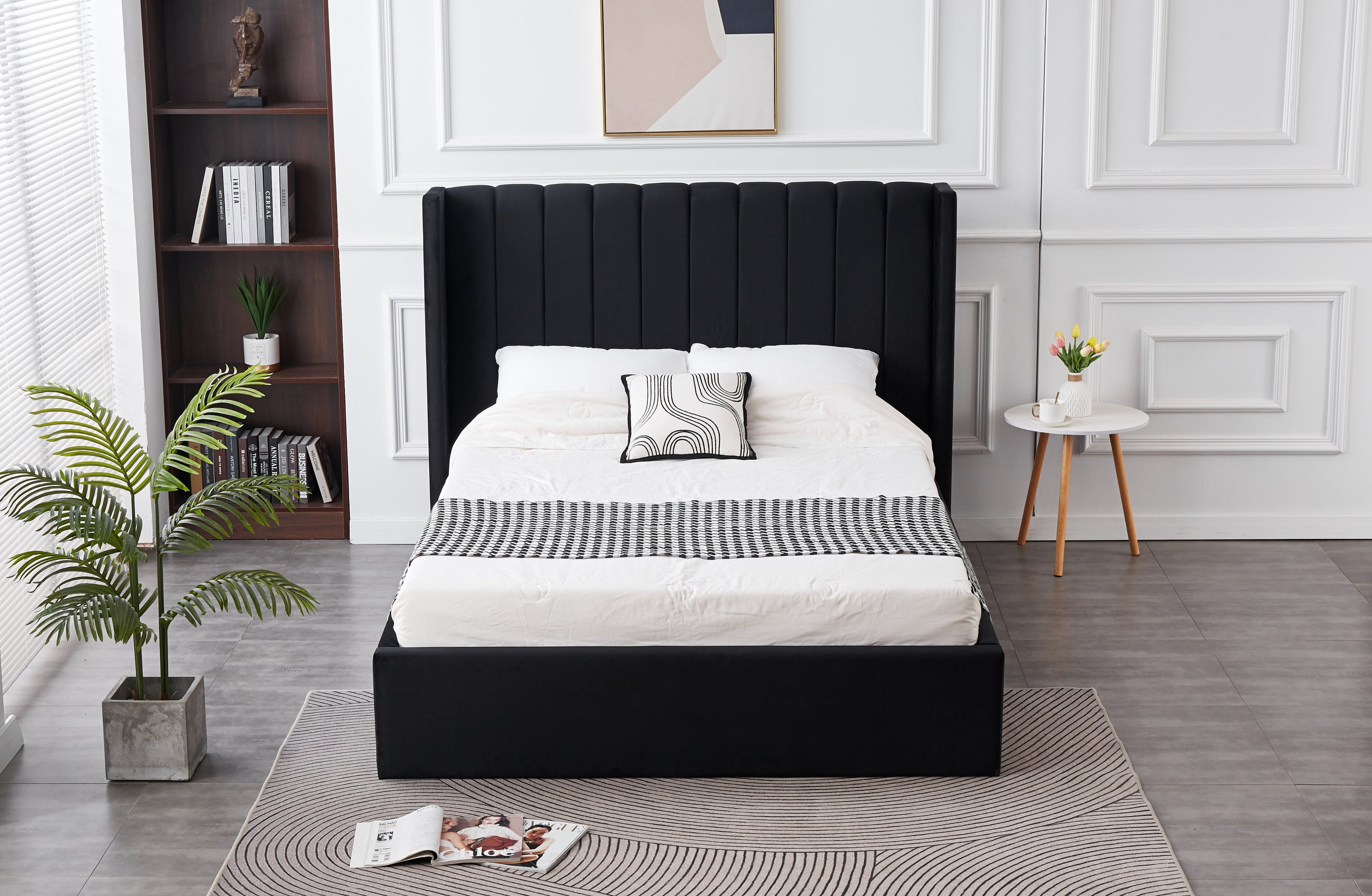 Hilton Velvet Gas Lift Bed in Black velvet, front view styled with bedding in a contemporary room.