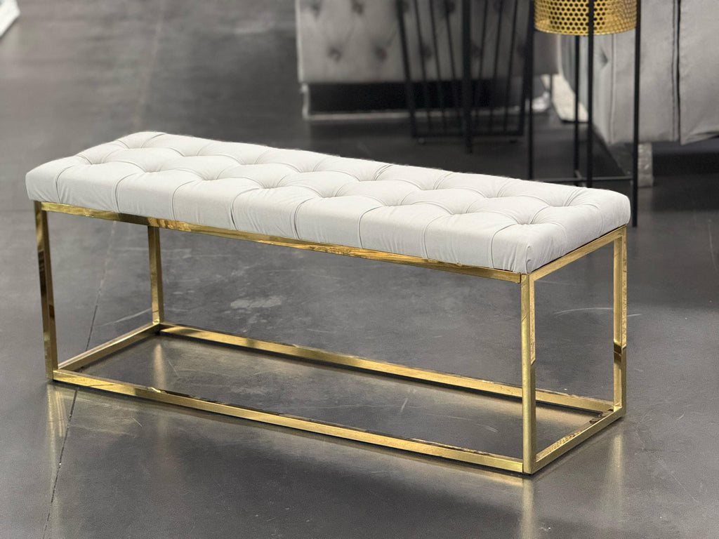 Holly Ottoman in Beige velvet with gold frame.