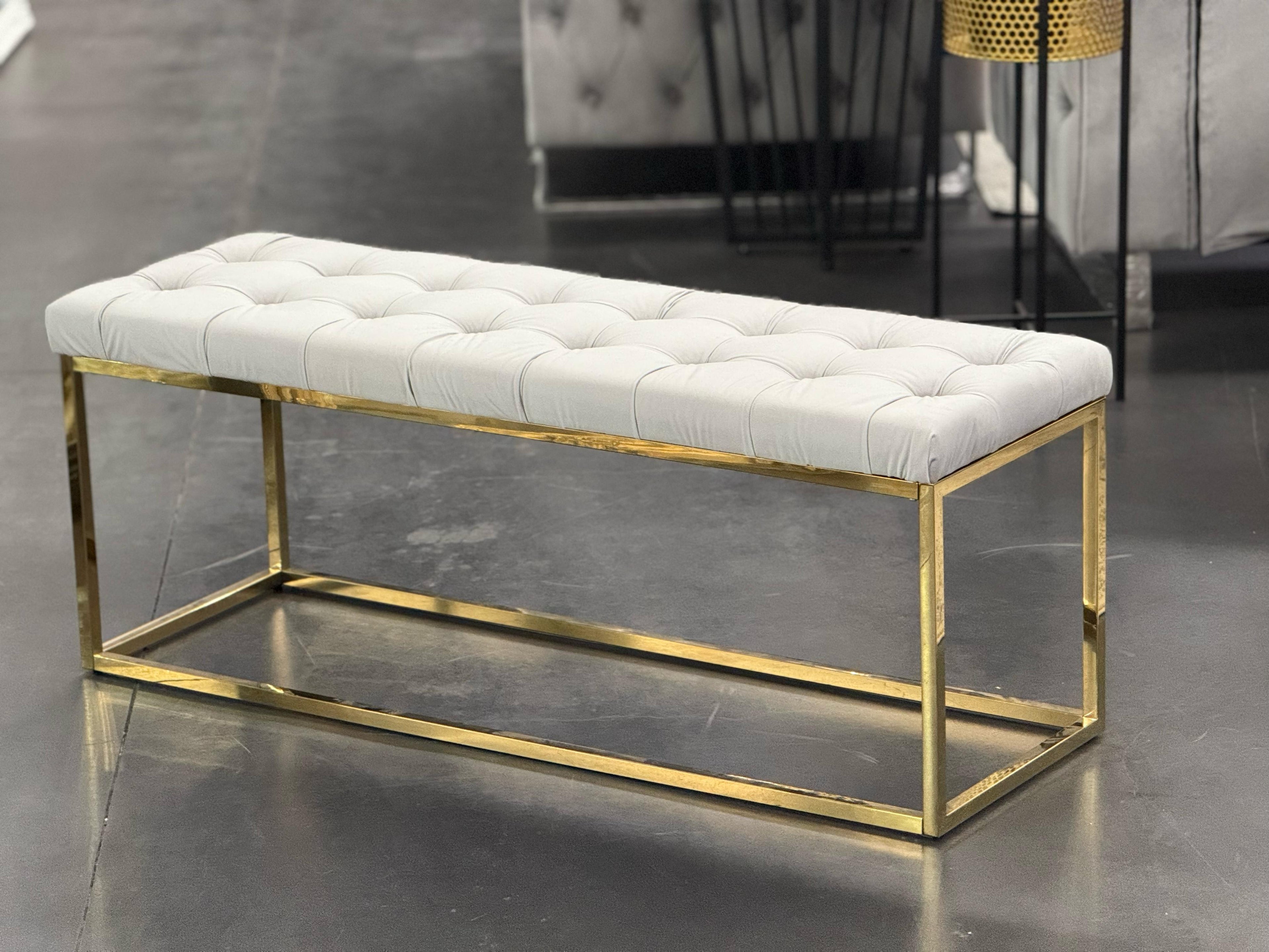 Holly Ottoman in Beige velvet with gold frame.