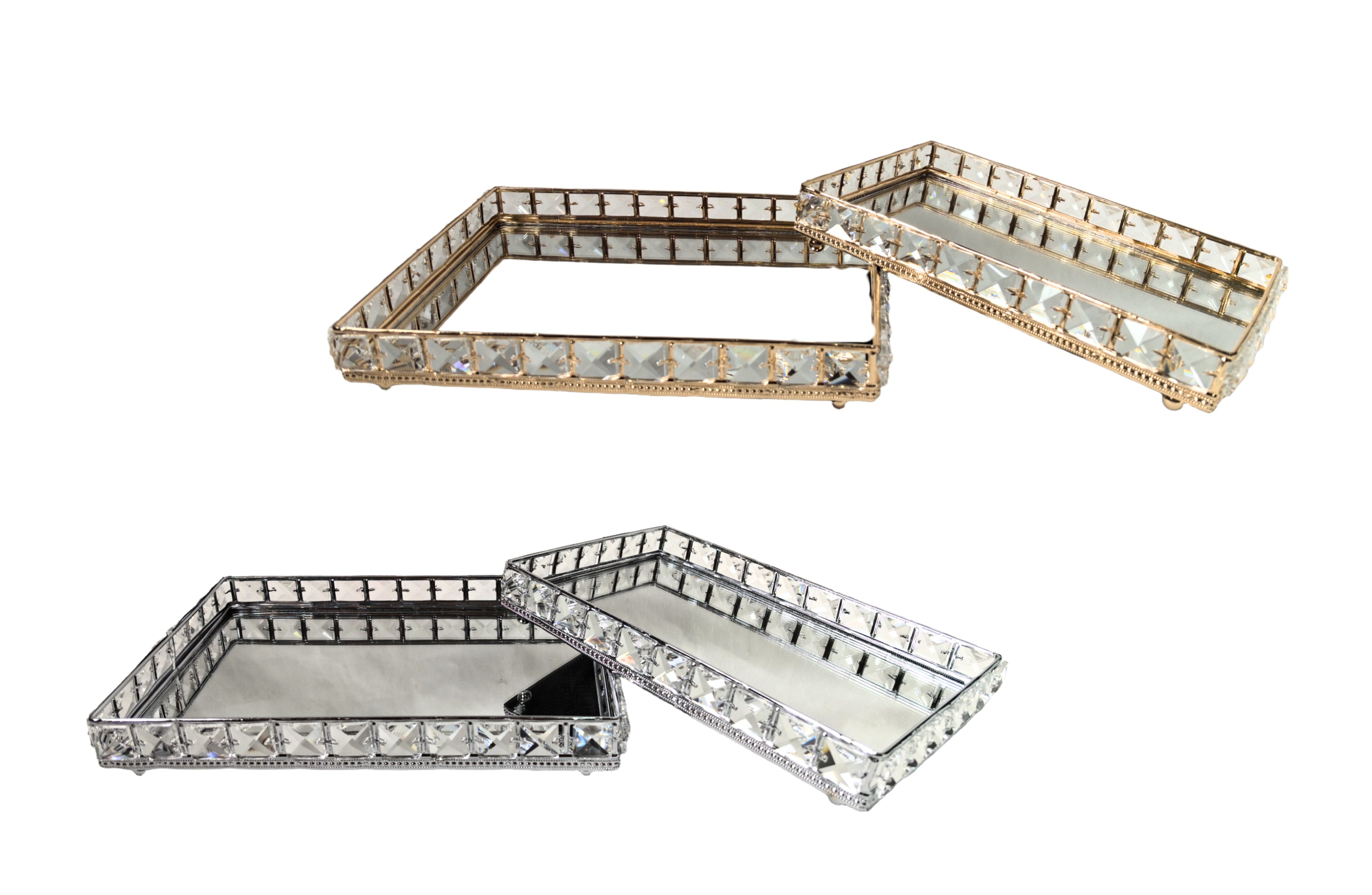 Katie rectangle tray sets in both gold and silver finishes, each with crystal accents and mirrored bases, available in two sizes.