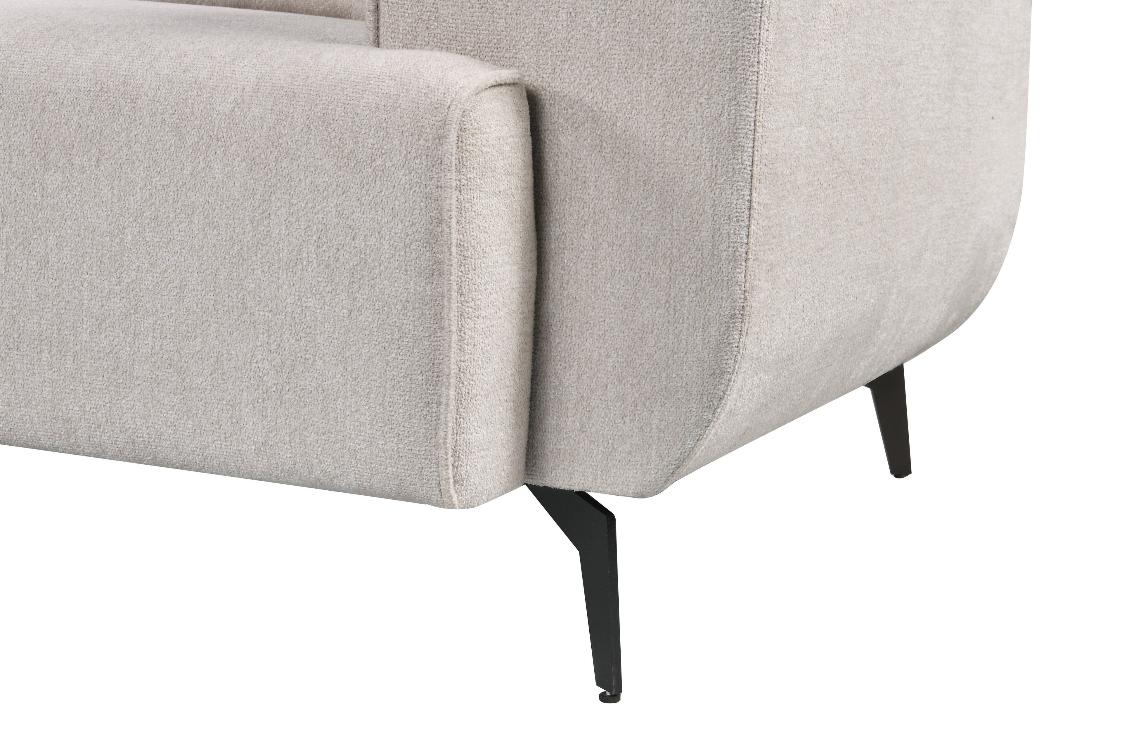 Close-up view of the Maddox Lounge Sofa leg in sleek black metal, highlighting its curved armrest, durable textured fabric, and modern elevated design.