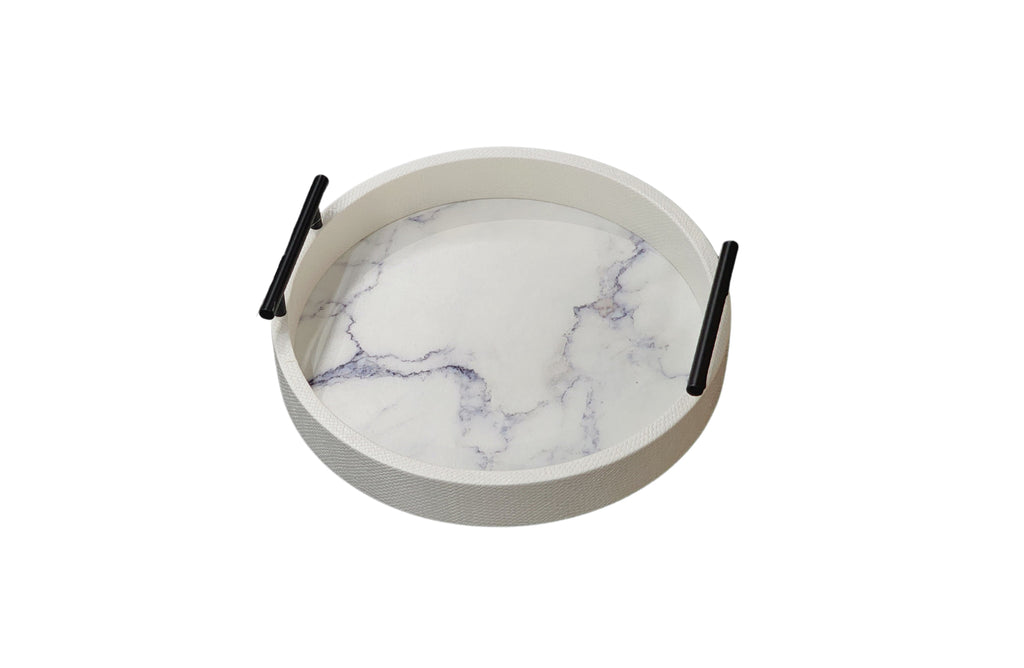 Small white round marble tray with black handles and faux marble base, 35cm diameter.