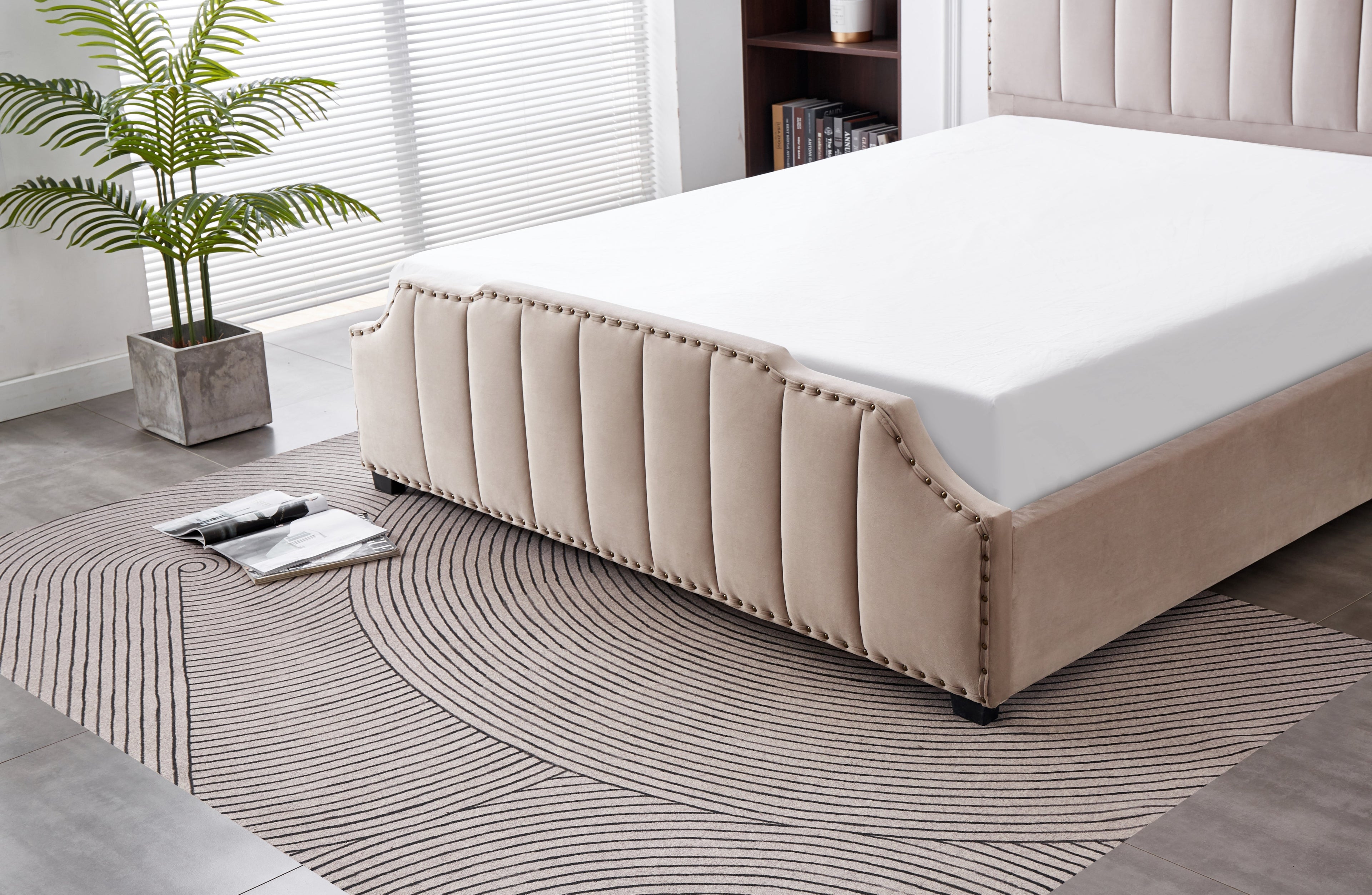 Close-up view of Santosa Champagne Velvet Bed tufted end board.