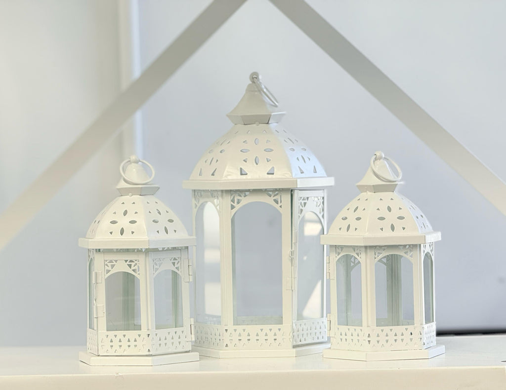 White Metal Lantern Set displayed in a modern setting – elegant trio of decorative lanterns ideal for candles or LED lights