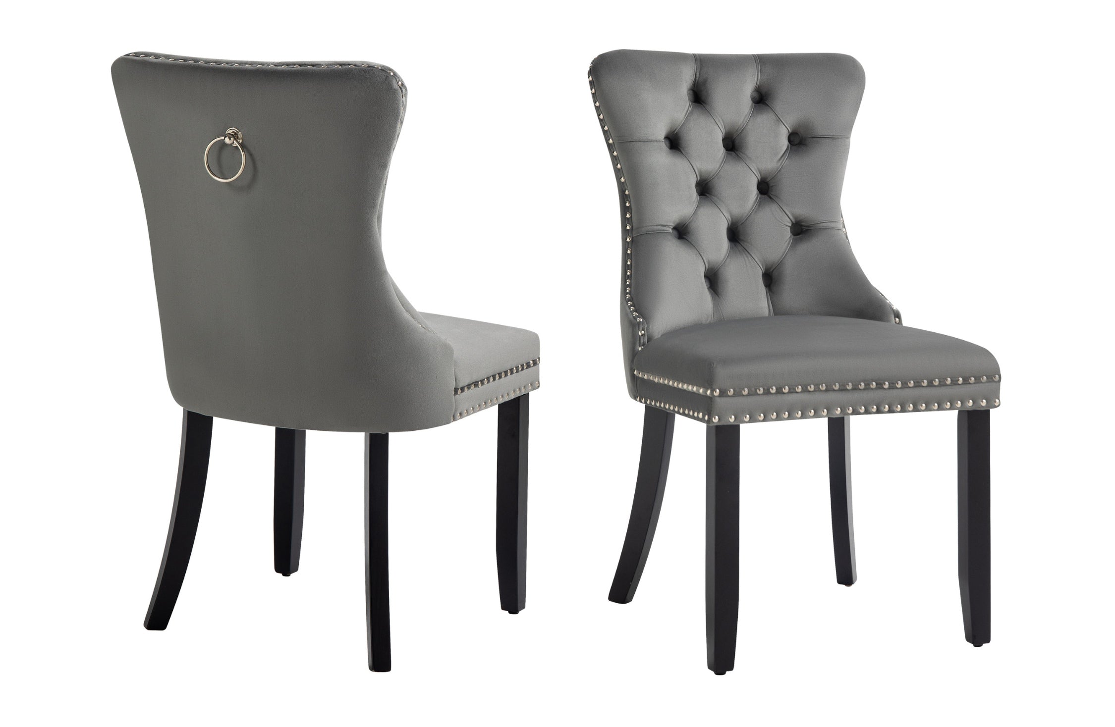 Pair of Alsea dark grey velvet dining chairs with tufted back and black rubberwood legs.