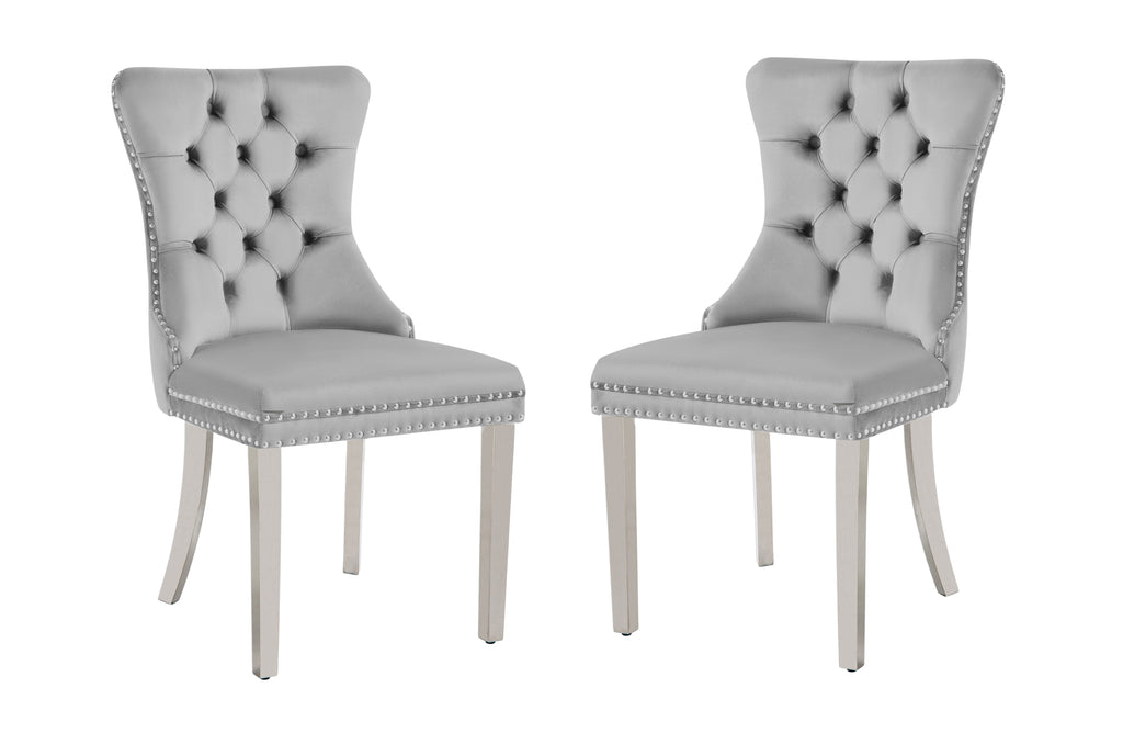Alsea light grey velvet dining chair with tufted back, stud trim, ring handle, and silver legs.