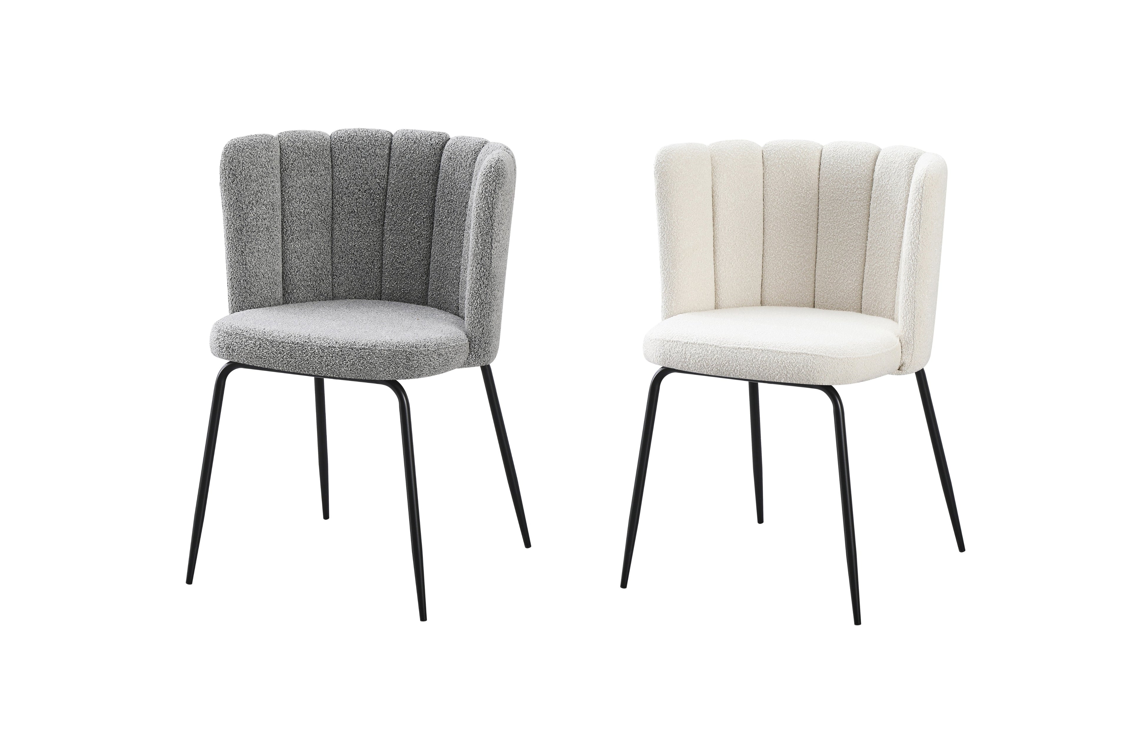 Set of 2 Amelia boucle dining chairs in grey and off-white fabric with black metal legs.