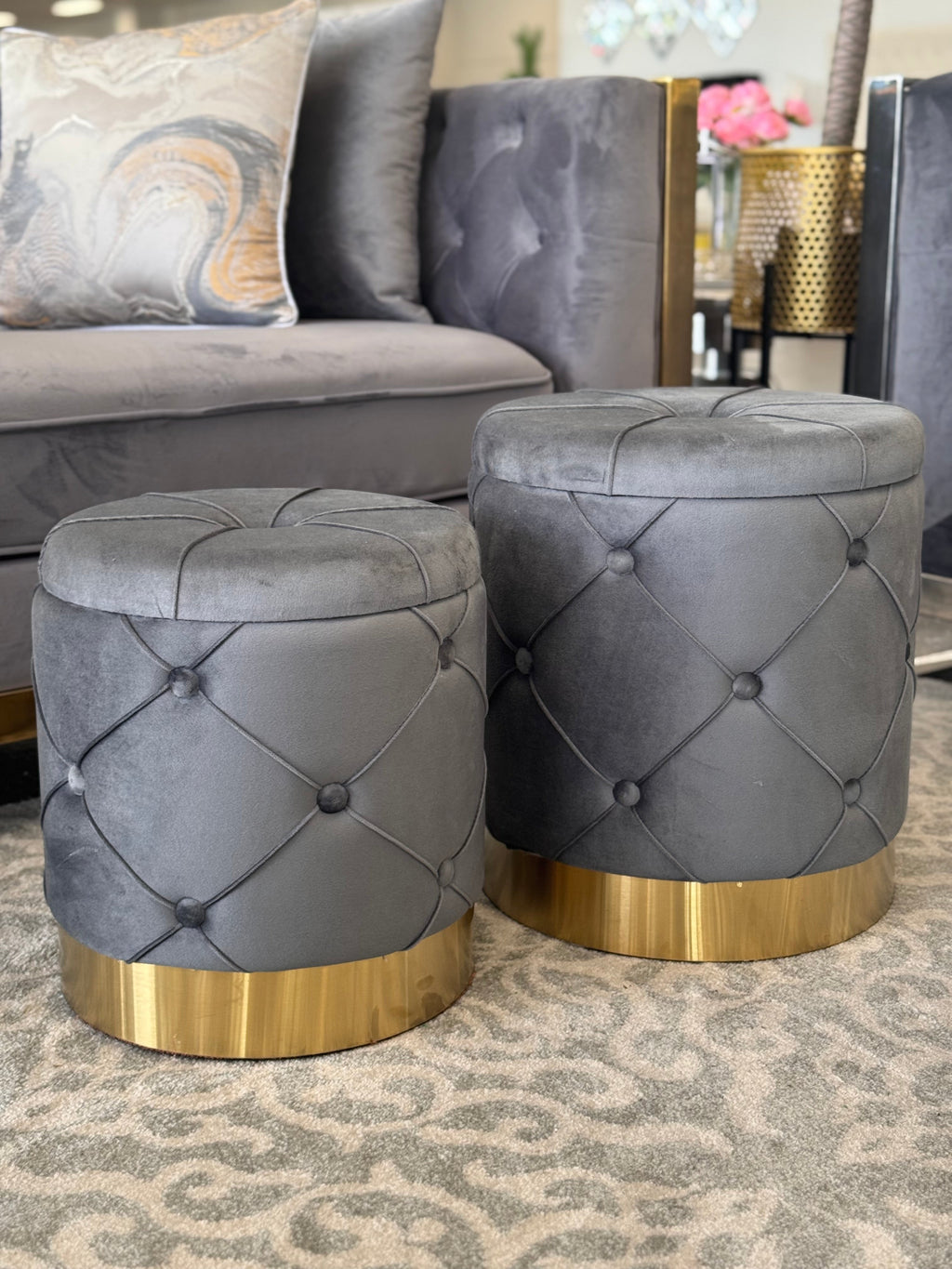 Grey Amy Storage Ottomans with gold base styled in living room interior setting