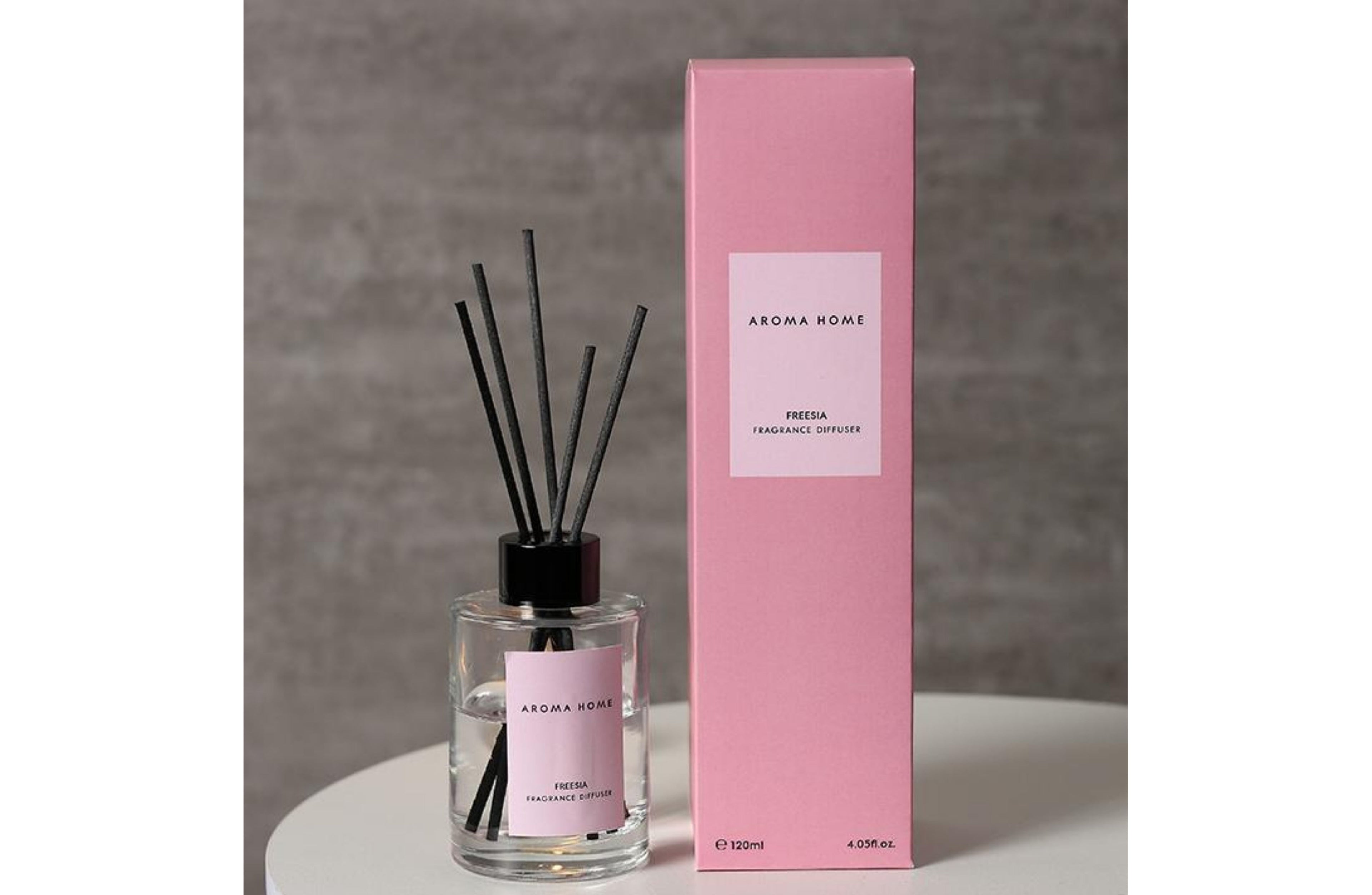 Elegant Freesia Diffuser – Soft floral scent in pink packaging