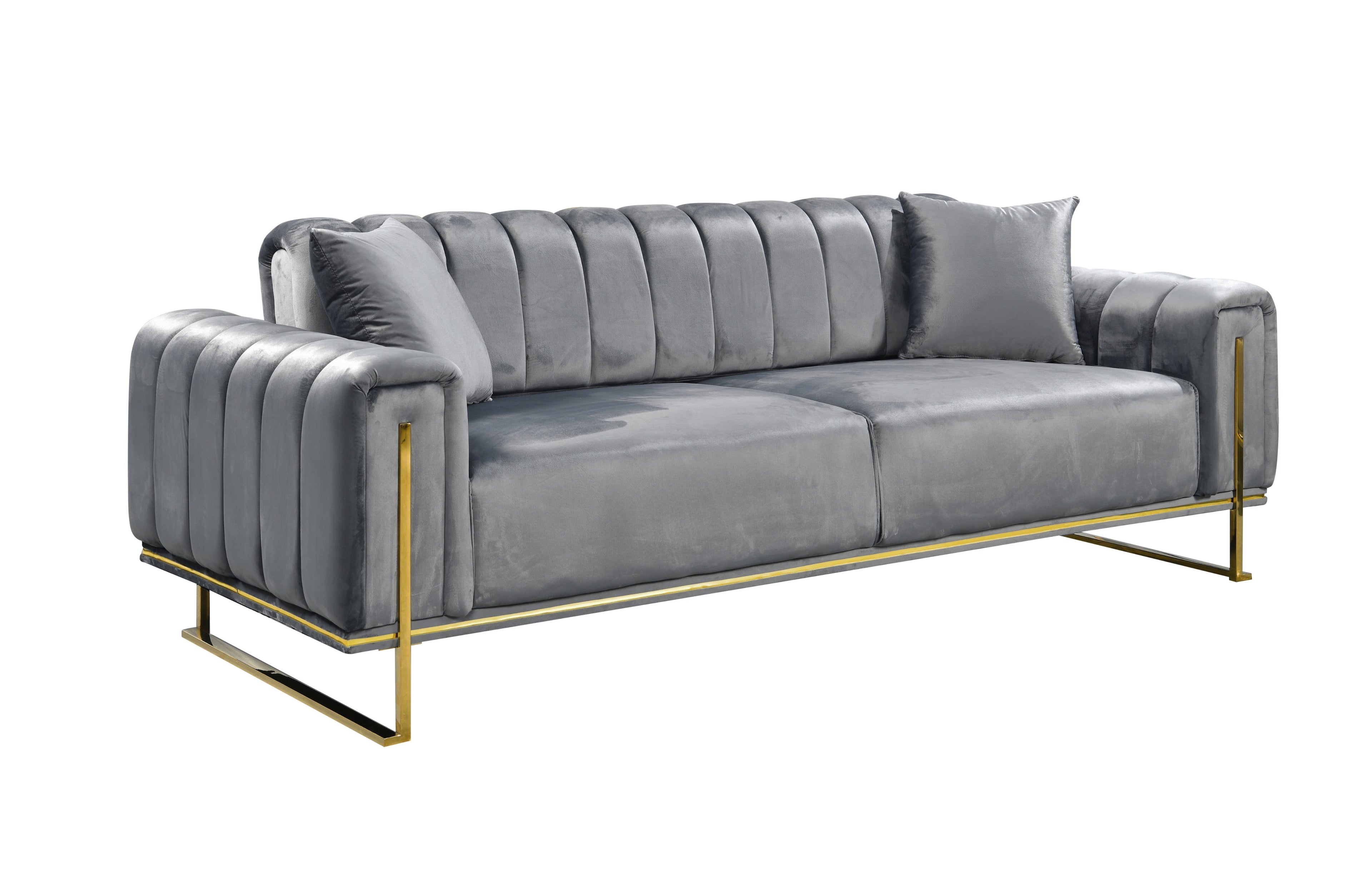 Dark grey velvet three-seater with plush cushioning and sleek gold accents