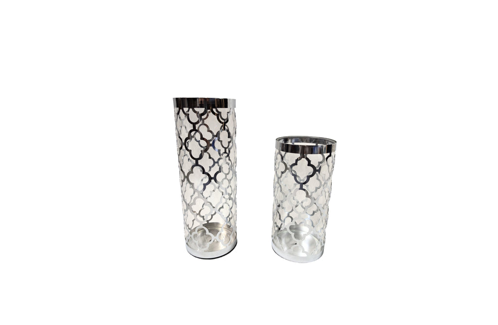 Sleek silver Ava vase set with decorative metal frame and glass, adding contemporary sophistication.