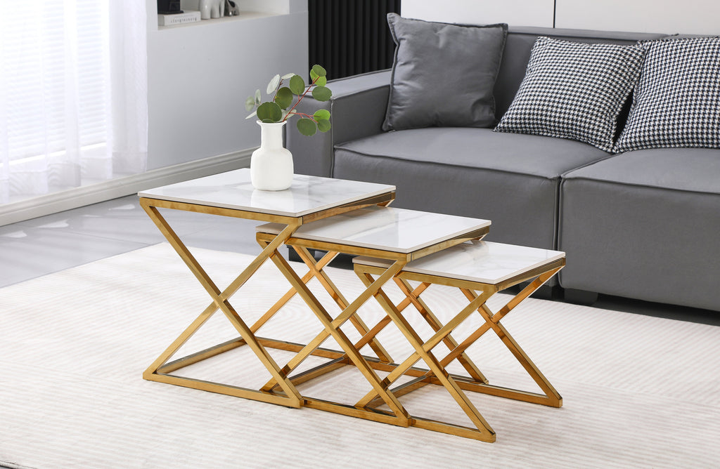 Bella side table set with polished gold frame and marble stone tops, styled in modern lounge.