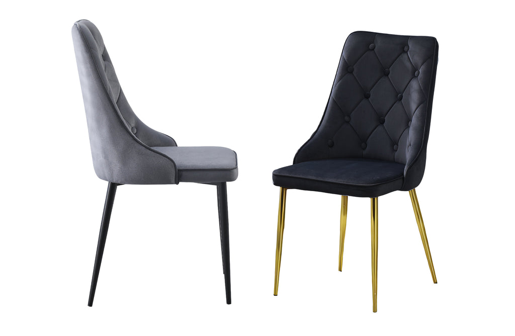 Black and grey button tufted dining chairs with velvet upholstery and metal legs for elegance.