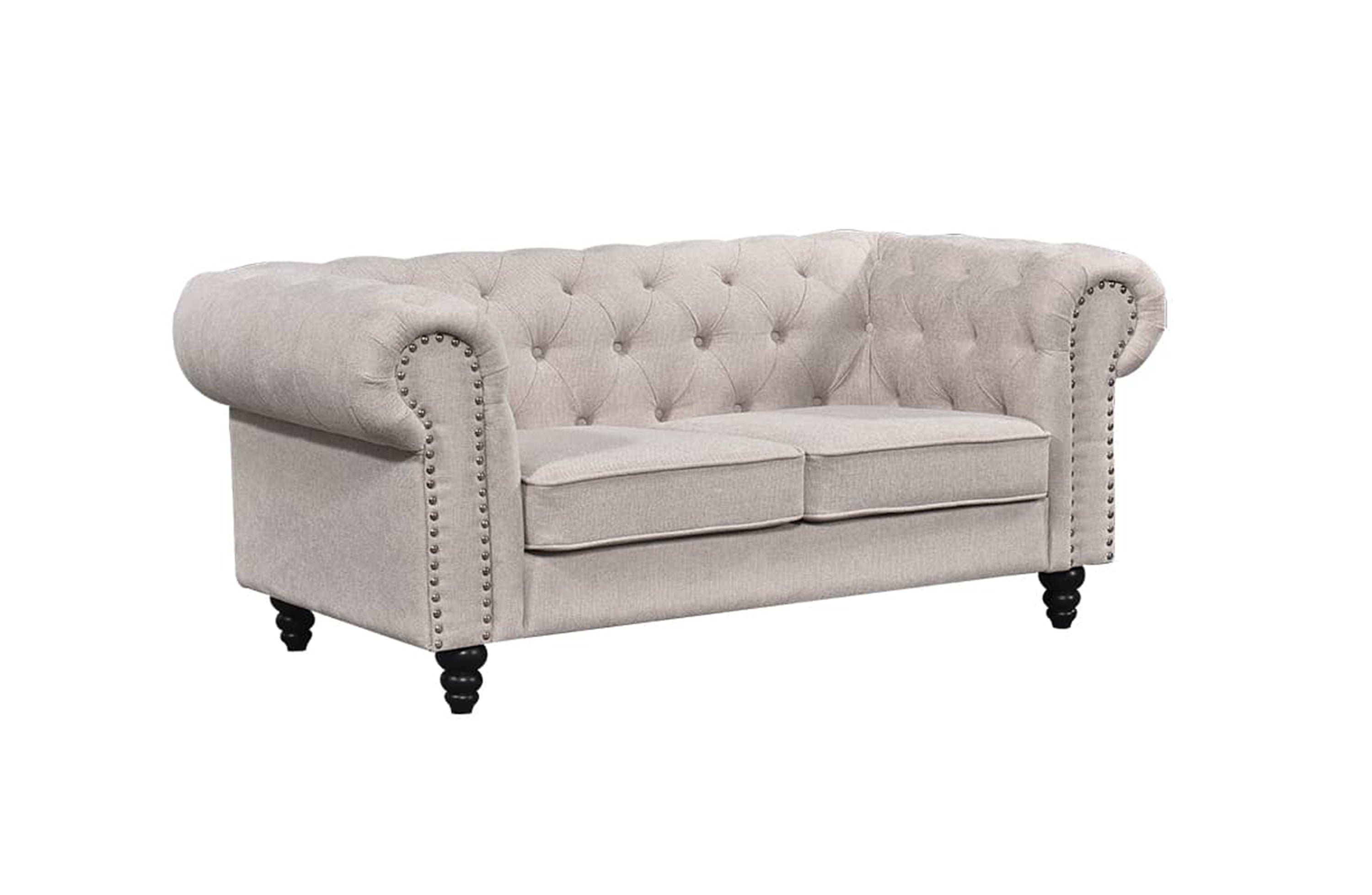Beige Chesterfield tufted two-seater sofa with rolled arms and timber legs