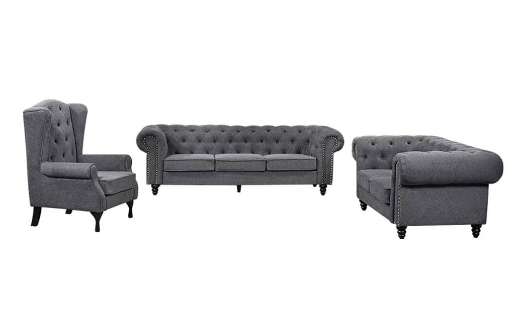 Charcoal grey Chesterfield full lounge set angle with tufted finish and timber base