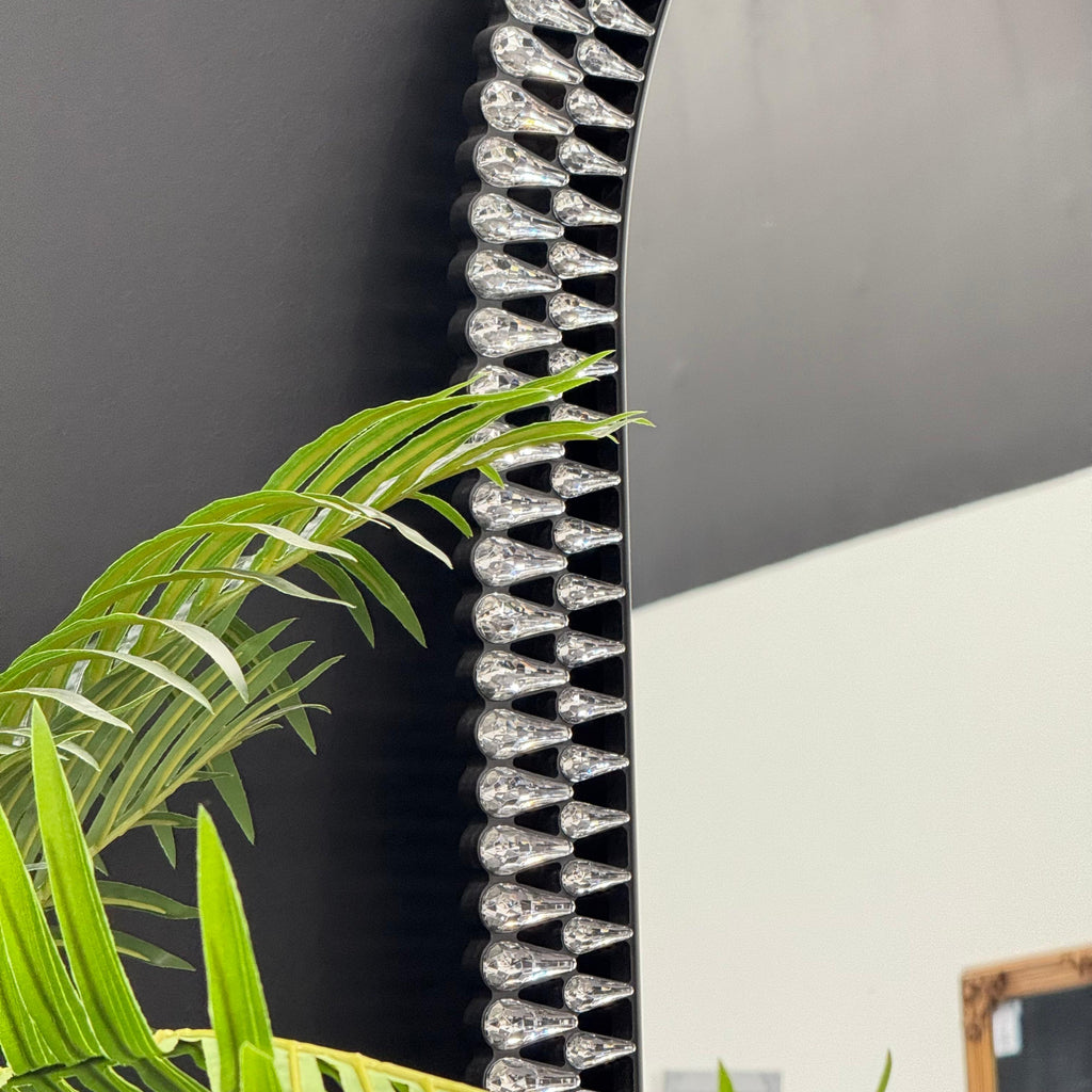 Close-up of Diamond Arch mirror showing textured diamond frame design with intricate luxury details.