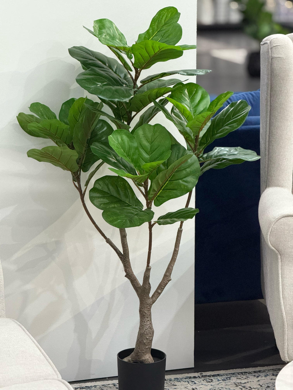 100cm Artificial Fiddle Leaf Plant displayed in a modern living room corner, adding a fresh, natural touch to the décor.