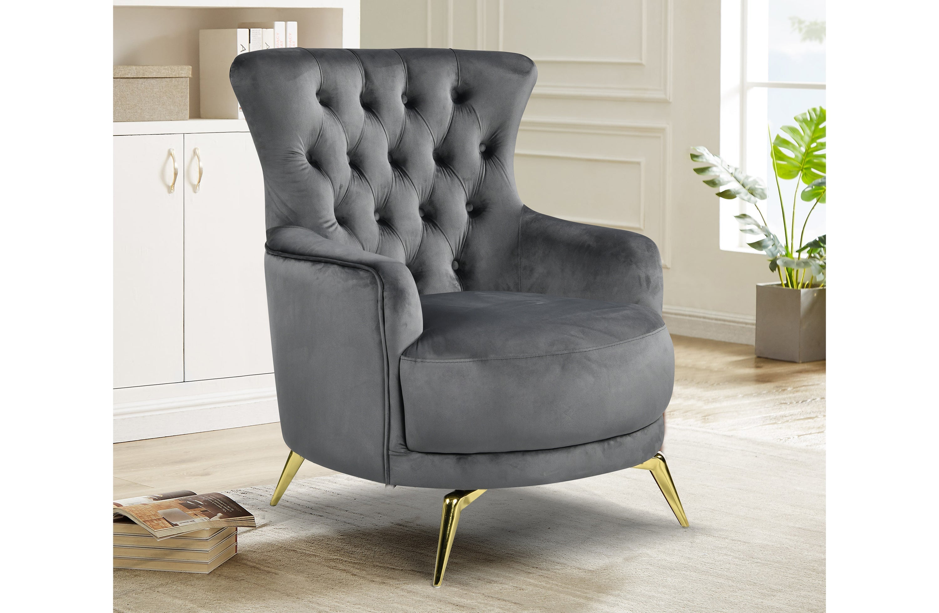 GRAND dark grey velvet tufted wing chair with gold legs in luxury styled room
