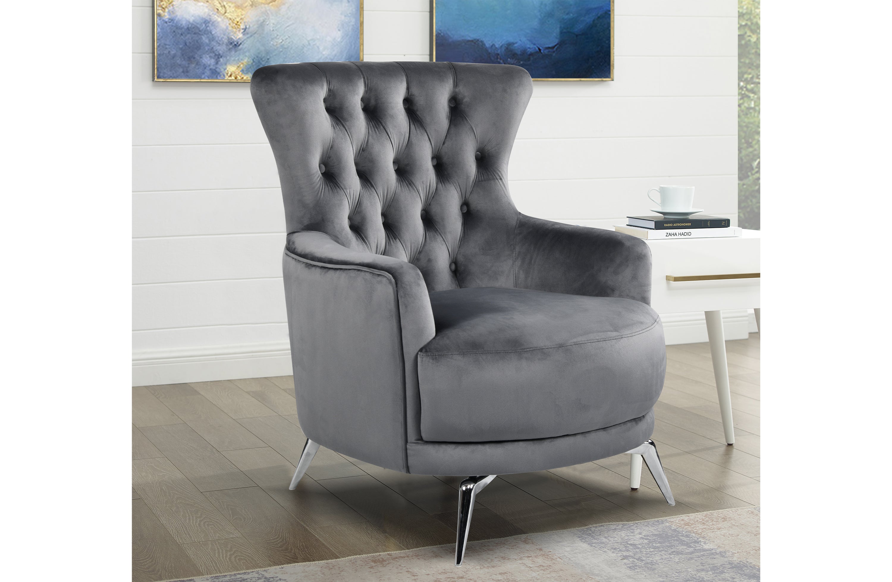GRAND dark grey velvet tufted wing chair with silver legs styled in modern living room