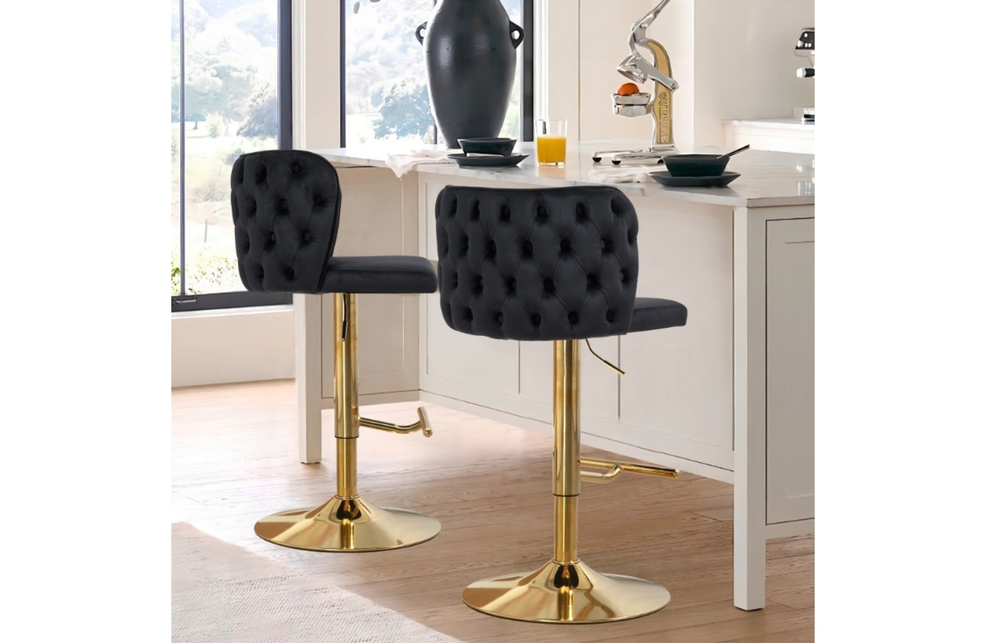 Lara black velvet tufted swivel bar stools with polished gold base in luxury kitchen