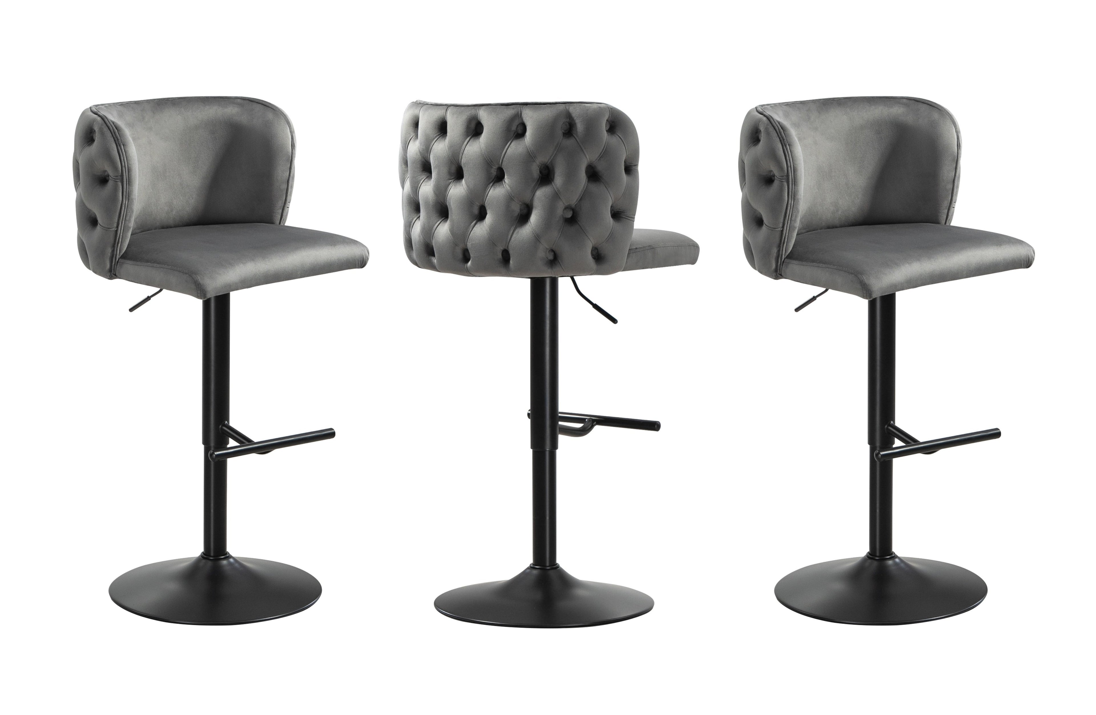 Pair of grey velvet bar stools with button tufted back and black stand, swivel design