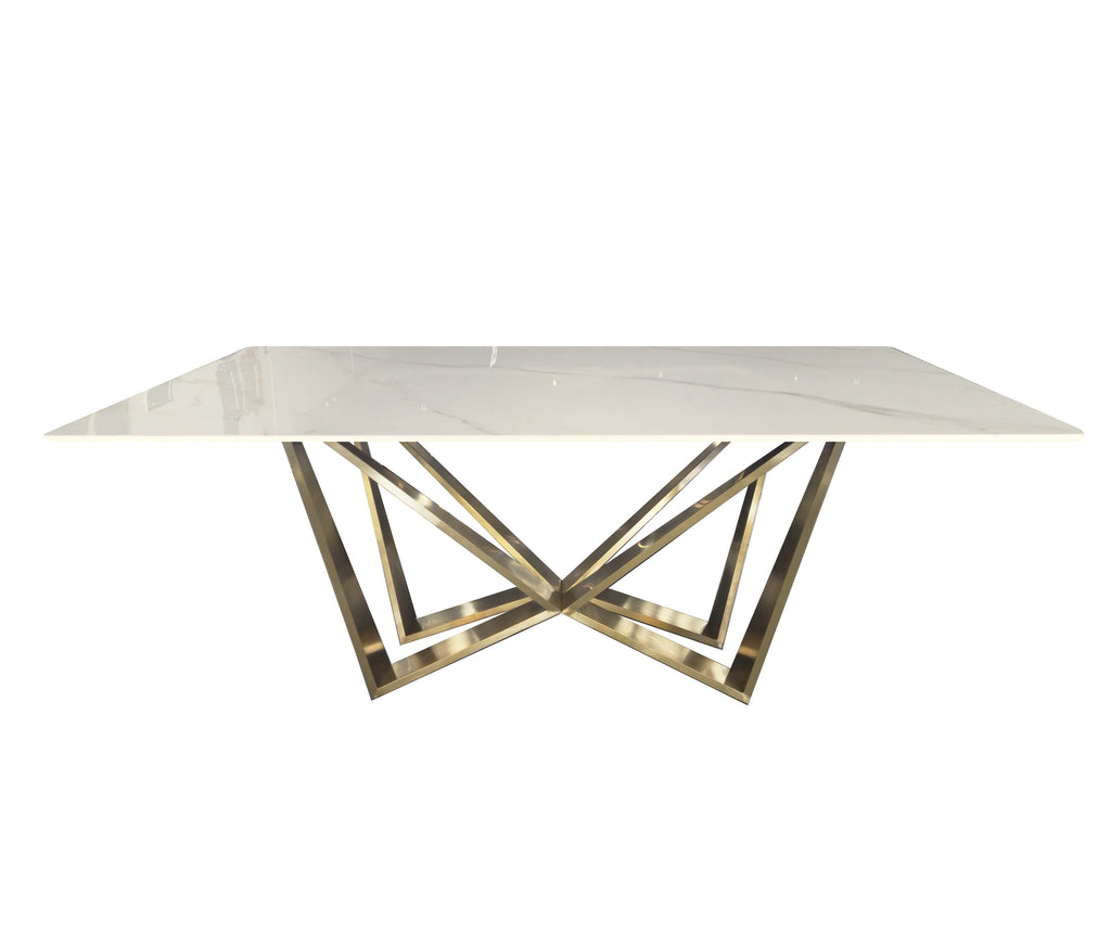Stylish Lenox Dining Table in gold stainless frame with sleek white marble stone top.