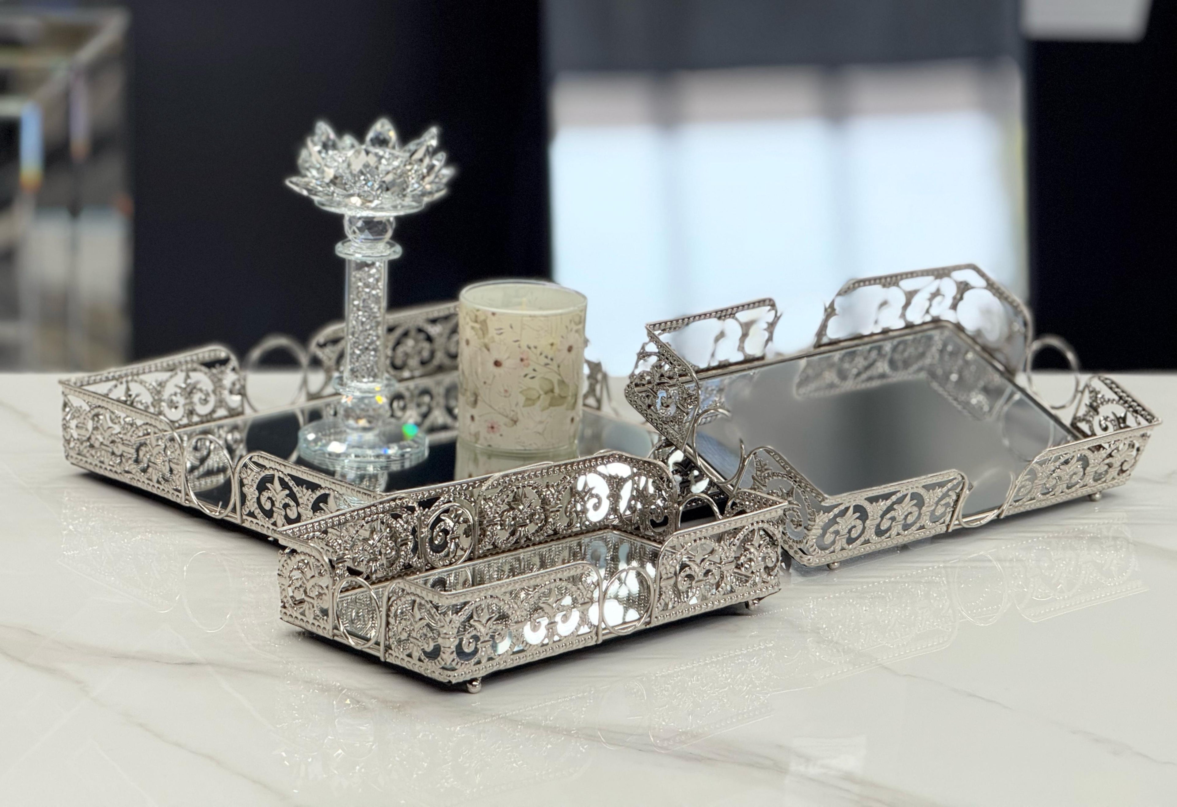 Silver Lucy rectangle trays styled with chic accents – perfect for sophisticated serving or luxury décor arrangements.