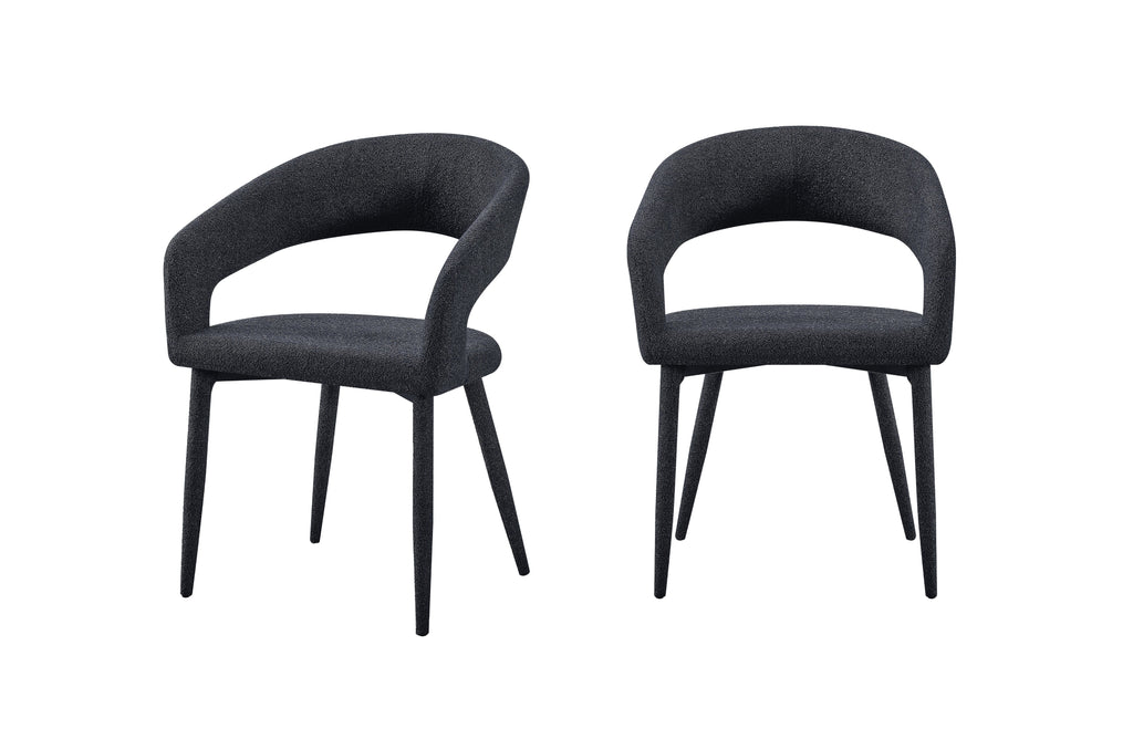 Set of 2 Marilyn boucle dining chairs in charcoal fabric with curved open back and black legs.