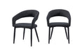 Set of 2 Marilyn boucle dining chairs in charcoal fabric with curved open back and black legs.