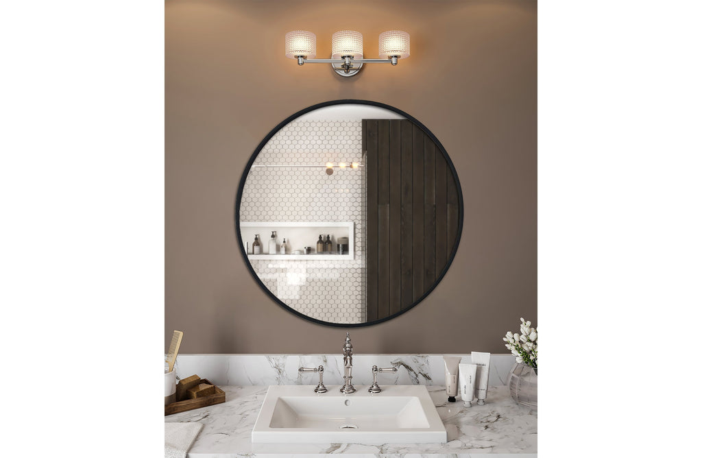 Sleek black round mirror styled above vanity with white basin and wall lights