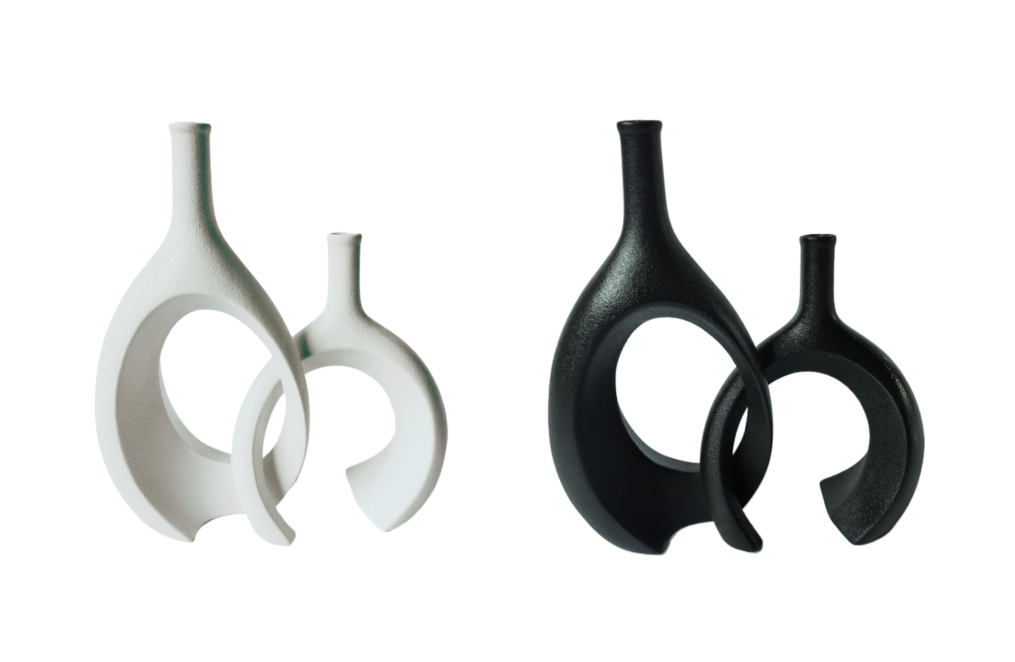 Stylish Nordic Unity vases in black and white, perfect for modern minimalist décor.