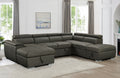 Charcoal grey plush modular chaise lounge styled in living room with sofa bed and storage.