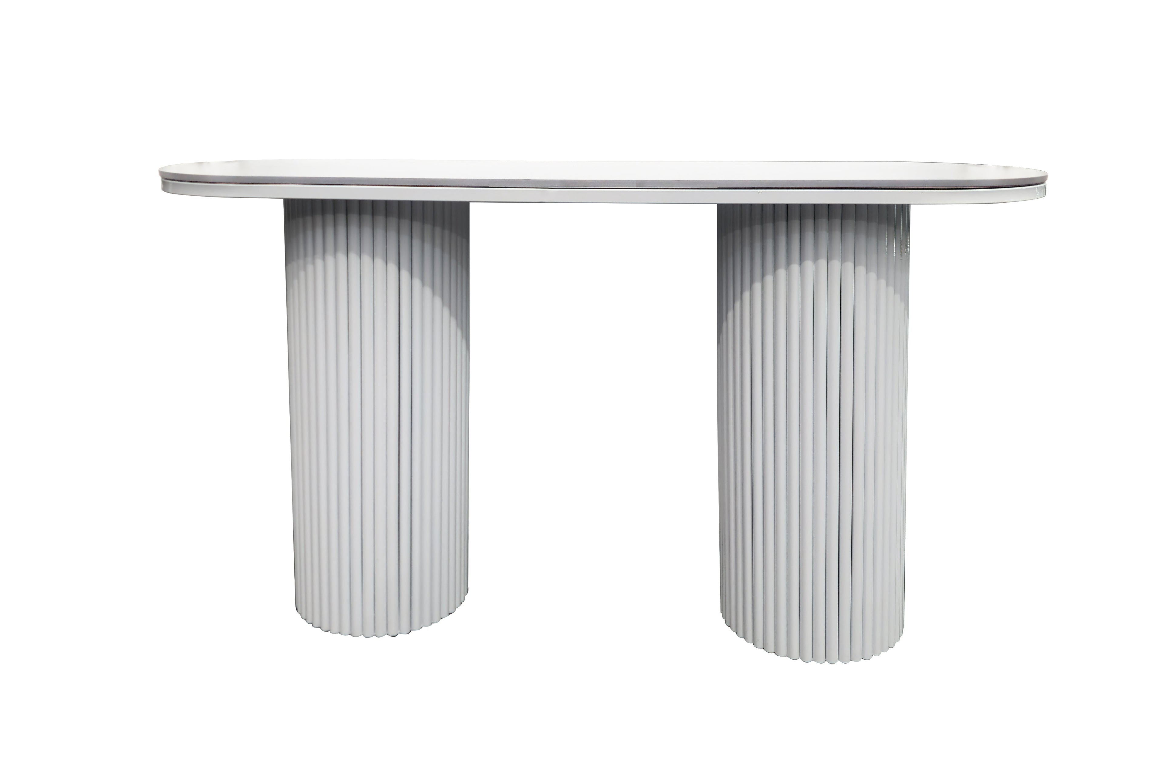 Ripple console table with white marble top and white fluted legs.