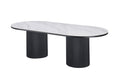 Ripple Oval Dining Table angled view with elegant white marble top and black legs.