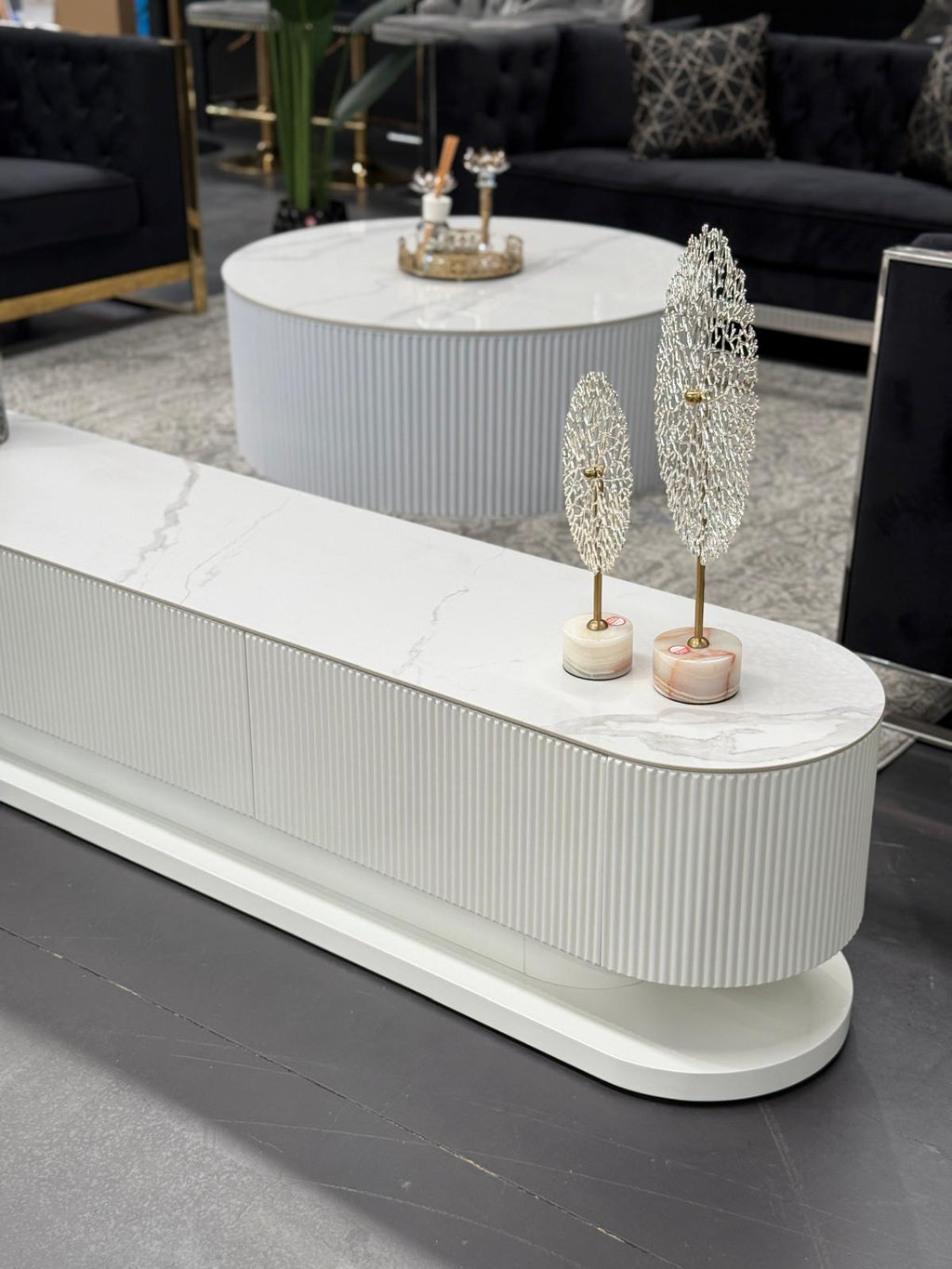 White ripple TV cabinet with smooth stone top and textured front panels