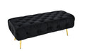 Black Shirley Ottoman with gold frame and tufted velvet seat, modern and elegant design.