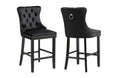 Pair of black velvet Sorrento bar stools with tufted design and wooden legs