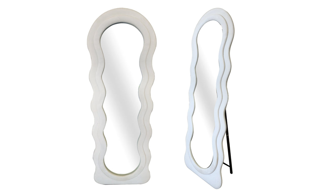 Cloud Wavy velvet mirror in cream, free standing or wall-mounted design with wavy frame.