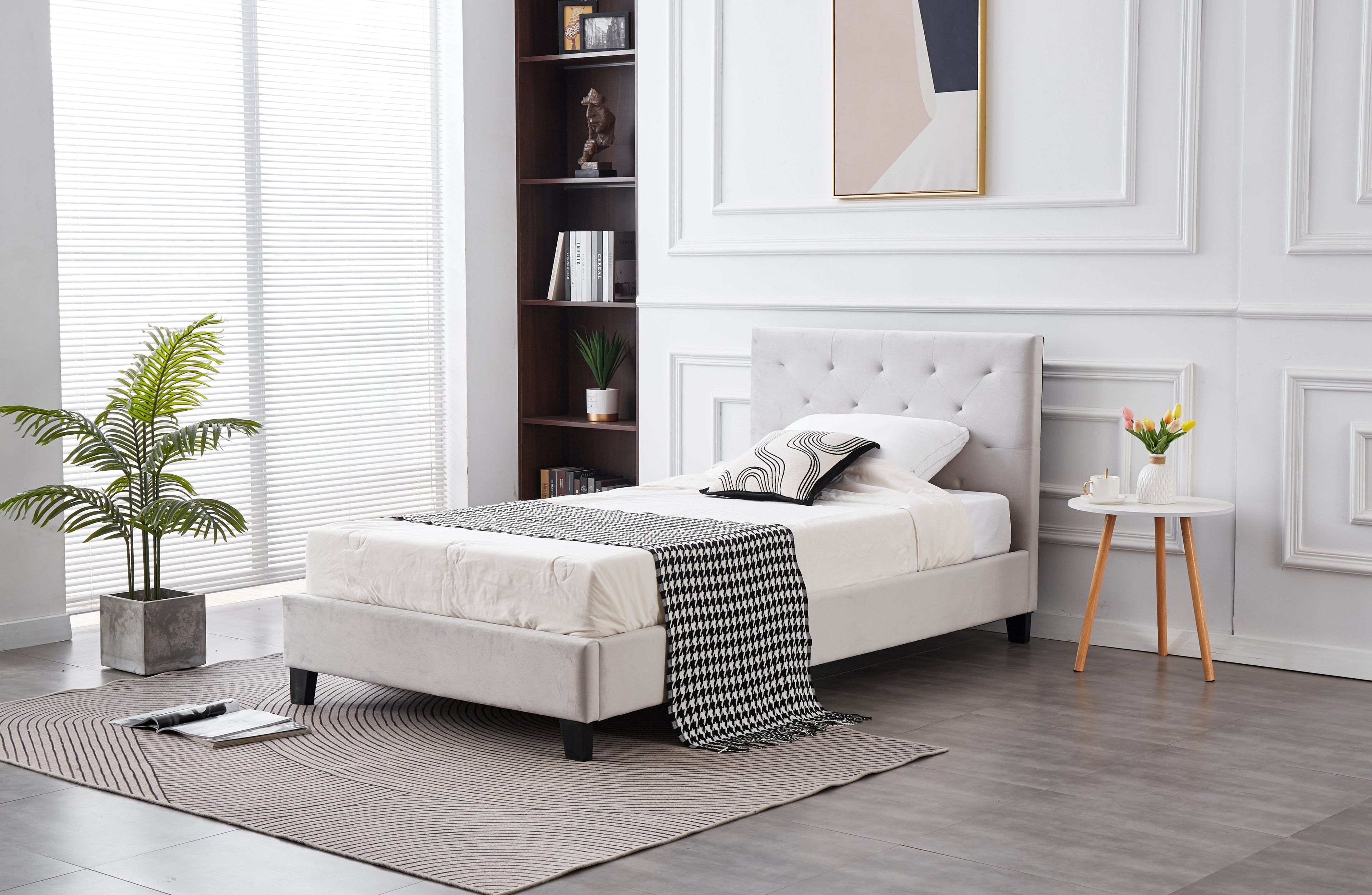 Side view of Winston Velvet Bed in light grey with plush velvet and tufted style.